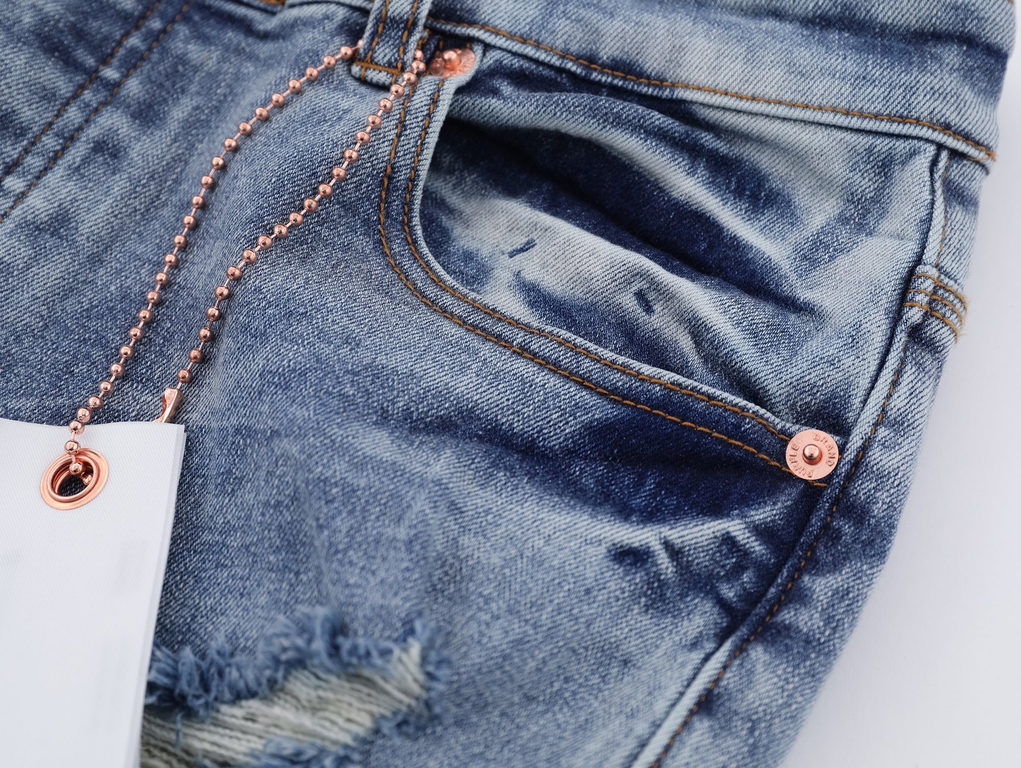 P117 Distressed Low Cuffed Jeans