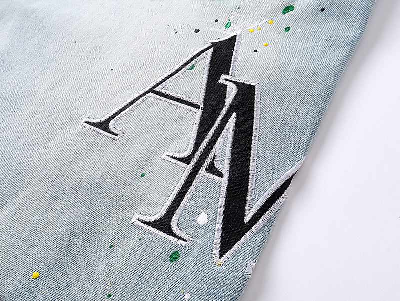 Amiri Staggered Logo Painted Jeans