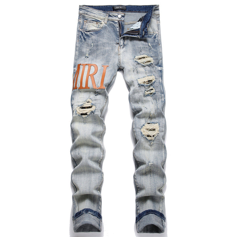'Orange Lettered Ripped' Jeans