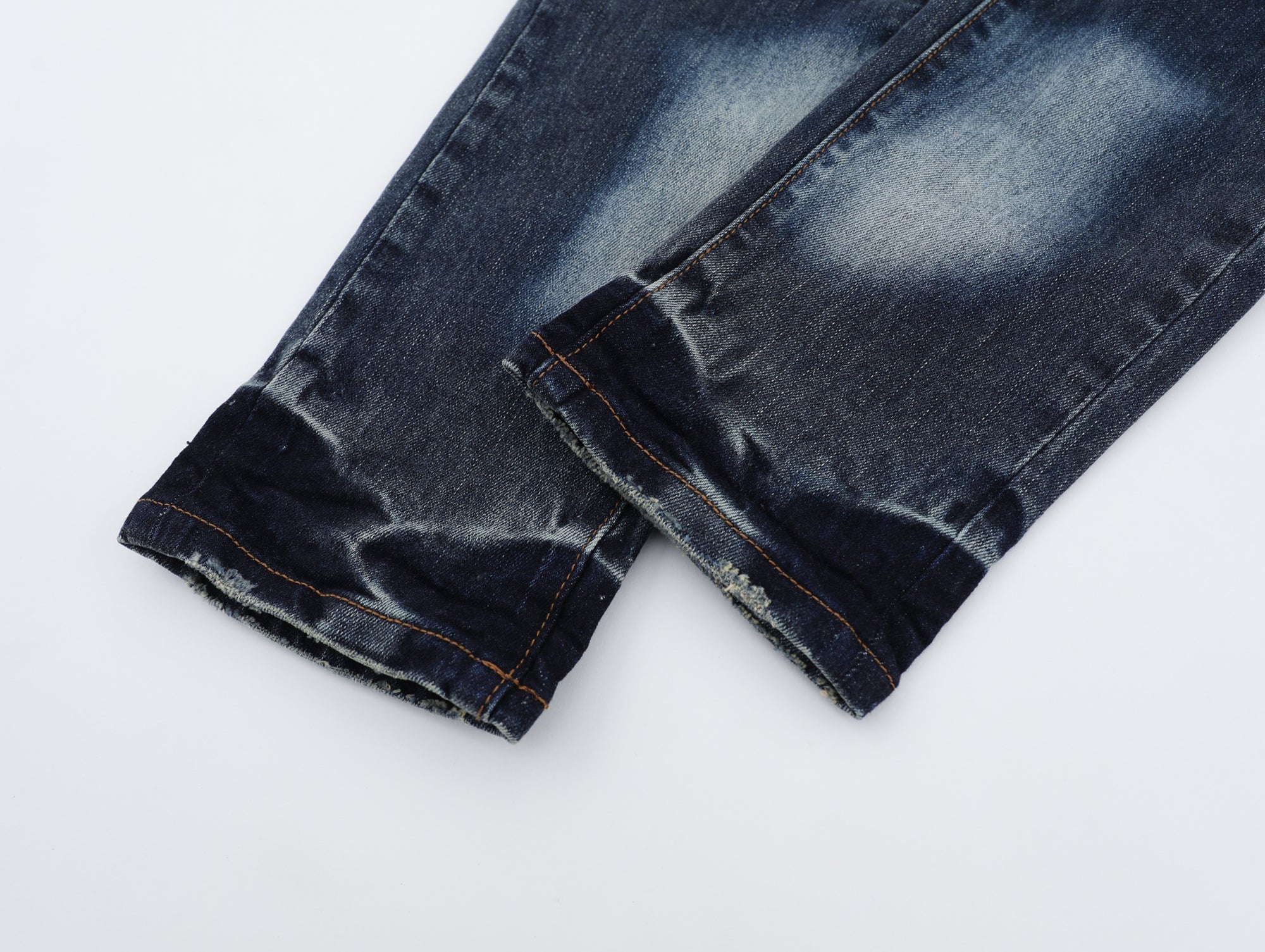 P125 Ripped Denim Jeans