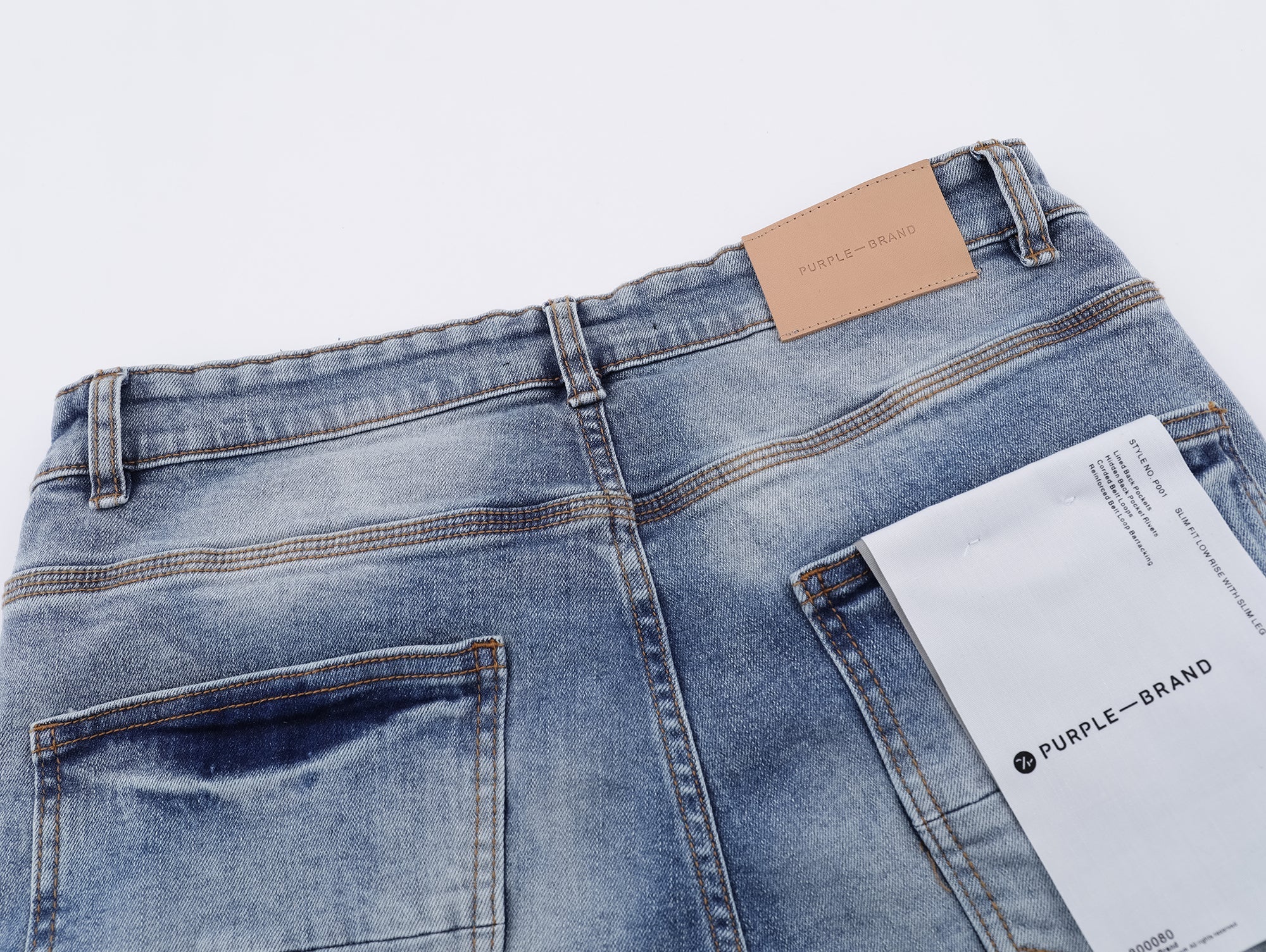 P117 Distressed Low Cuffed Jeans