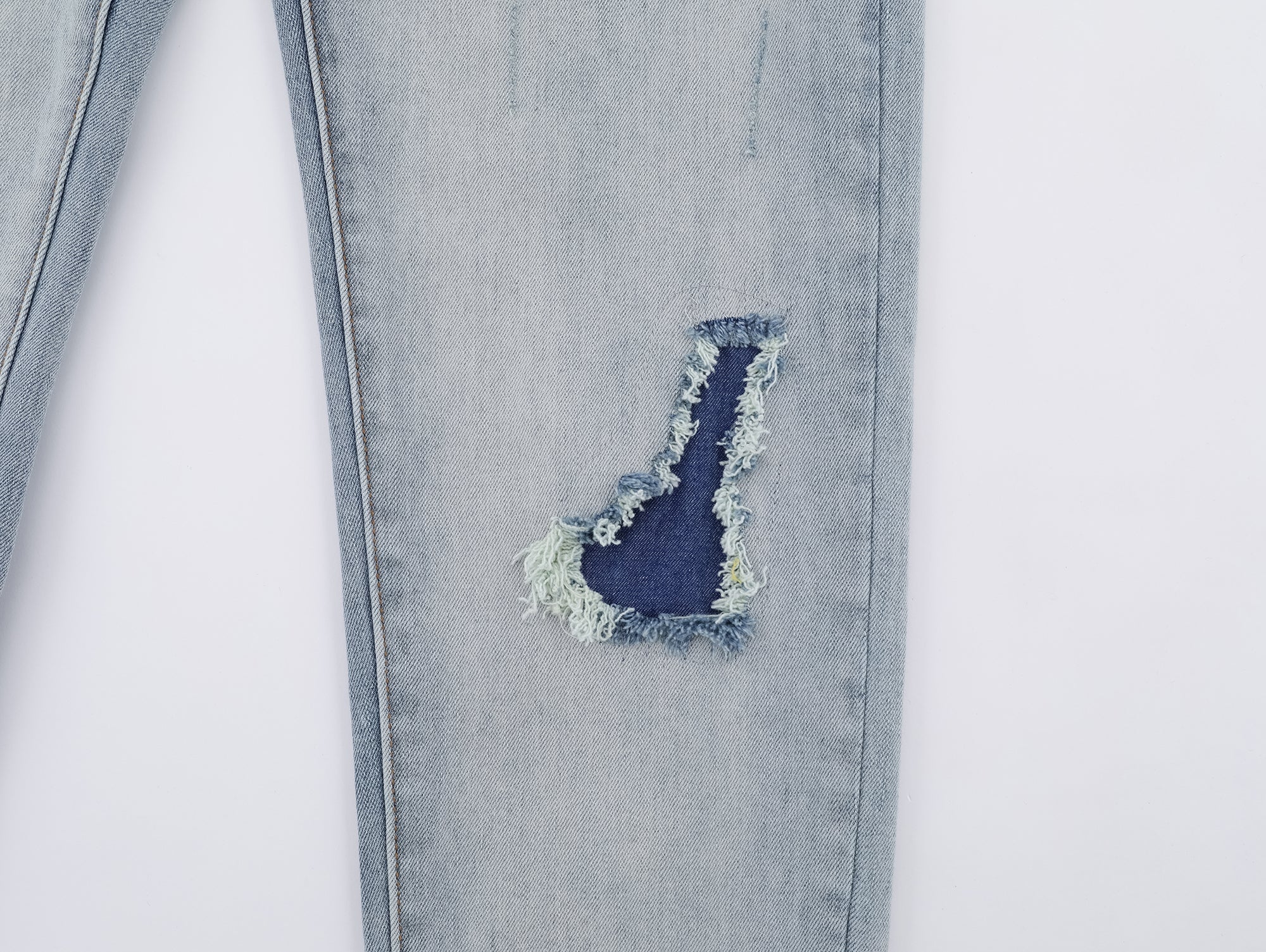 P130 Ripped Light Blue Jeans